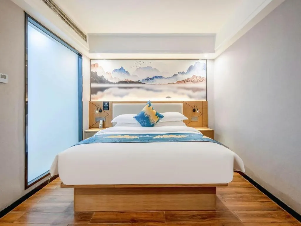 Bed in Borrman Hotel Nanning Anji Passenger Station Xijin Metro Station