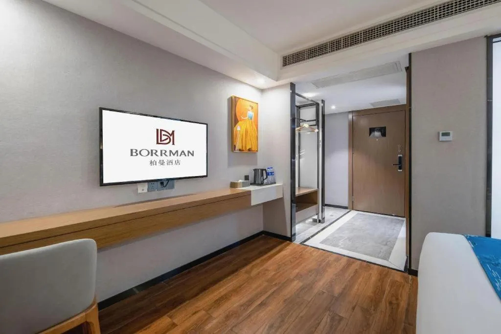 Bed in Borrman Hotel Nanning Anji Passenger Station Xijin Metro Station