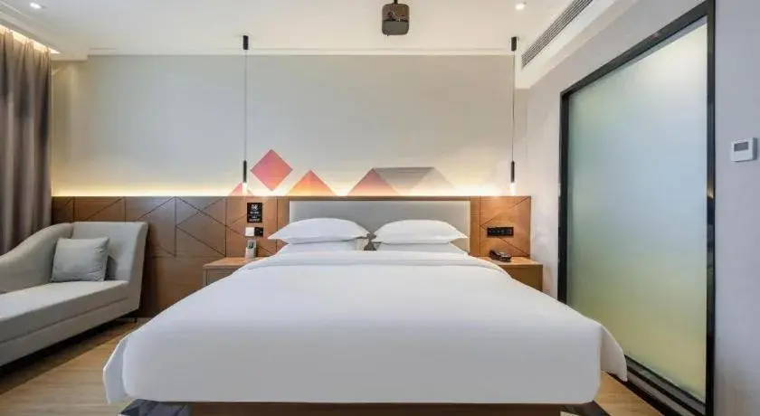 Bed in Borrman Hotel Nanning Anji Passenger Station Xijin Metro Station Bed in Borrman Hotel Nanning Anji Passenger Station Xijin Metro Station