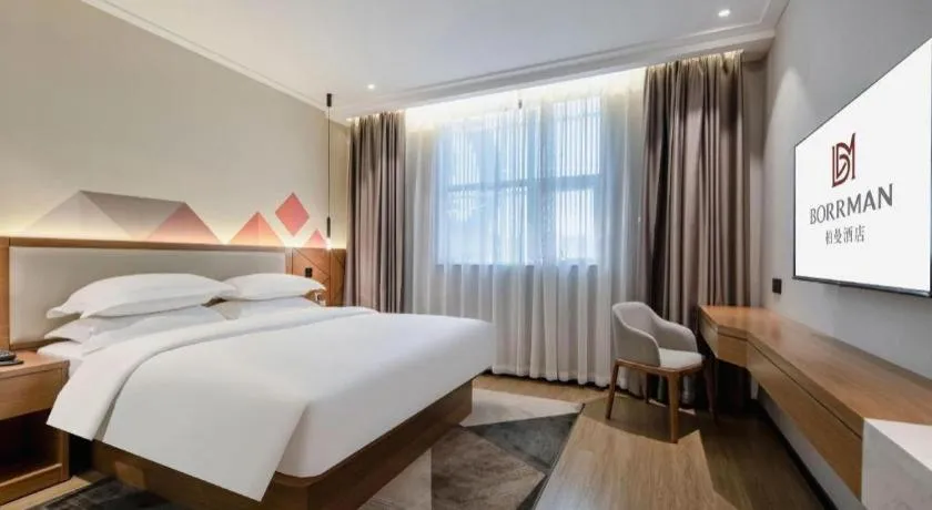 Bed in Borrman Hotel Nanning Anji Passenger Station Xijin Metro Station