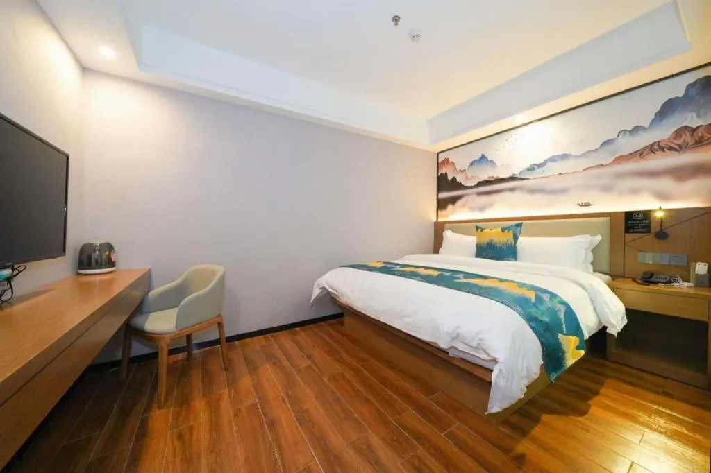 Bed in Borrman Hotel Nanning Anji Passenger Station Xijin Metro Station