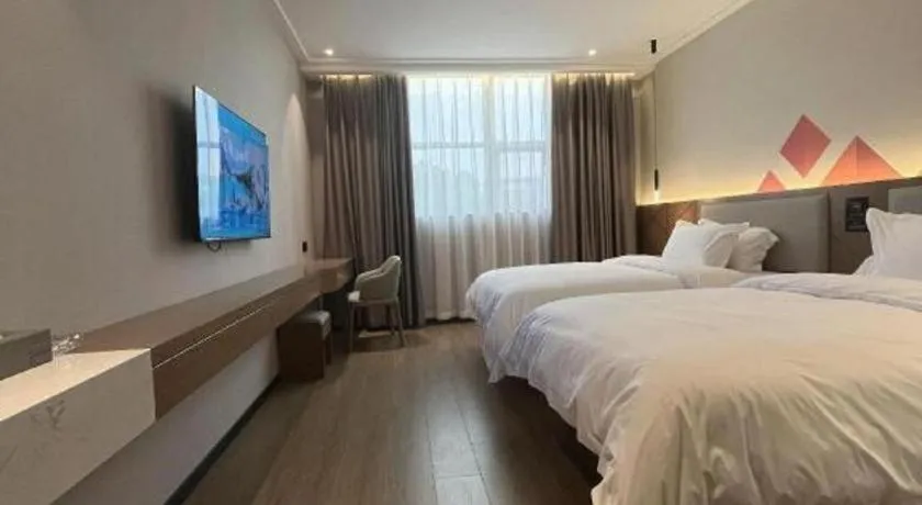 Bed in Borrman Hotel Nanning Anji Passenger Station Xijin Metro Station