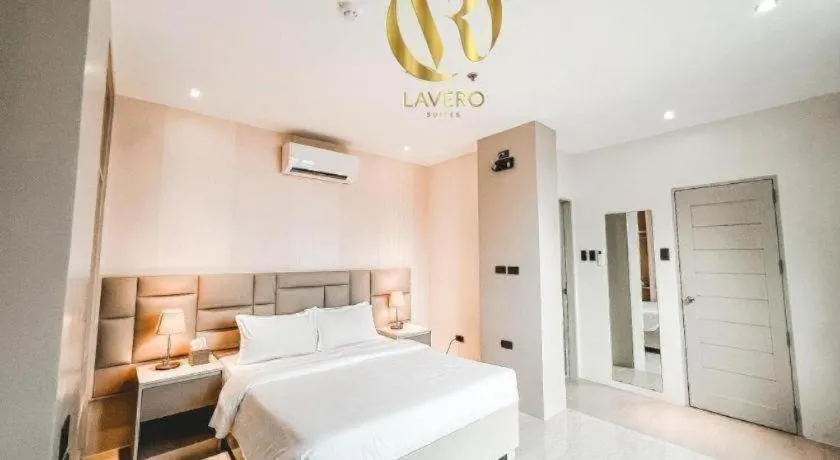 Bed in LAVERO SUITES