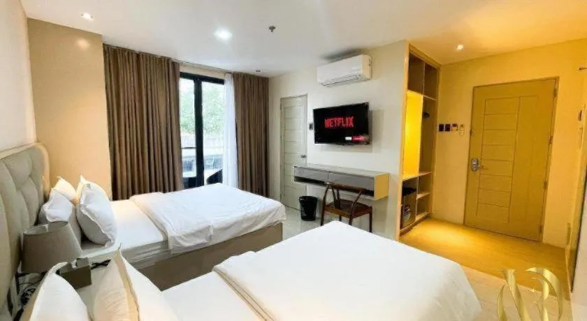 Bed in LAVERO SUITES