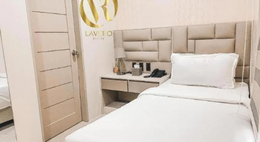 Bed in LAVERO SUITES