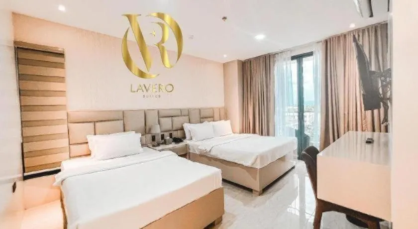 Bed in LAVERO SUITES