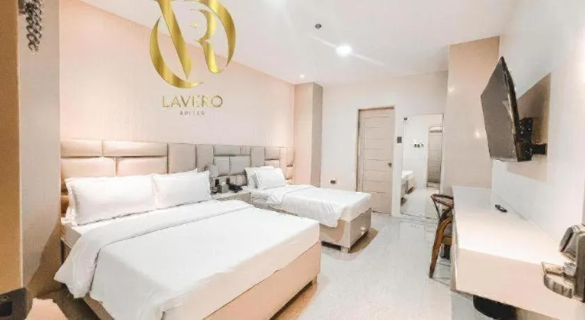 Bed in LAVERO SUITES