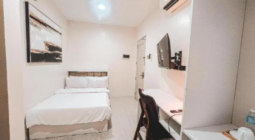 Bed in LAVERO SUITES