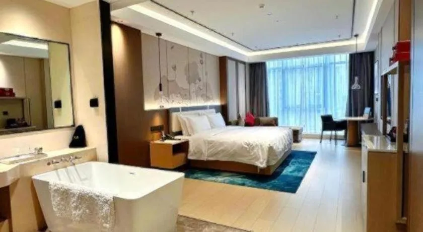 Bed in Ramada Encore by Wyndham Jinan Shanghe