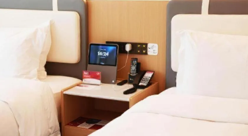 Bed in Ramada Encore by Wyndham Jinan Shanghe