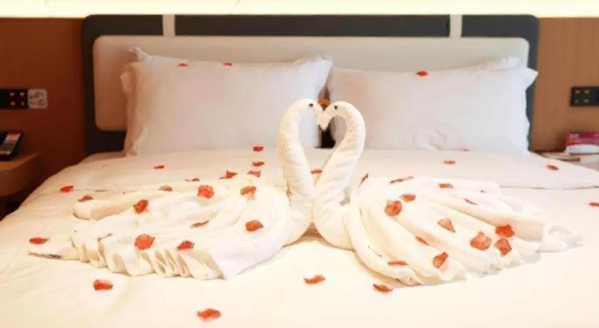 Bed in Ramada Encore by Wyndham Jinan Shanghe