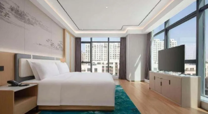 Bed in Ramada Encore by Wyndham Jinan Shanghe