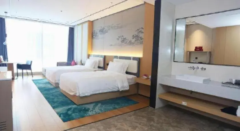 Bed in Ramada Encore by Wyndham Jinan Shanghe Bed in Ramada Encore by Wyndham Jinan Shanghe