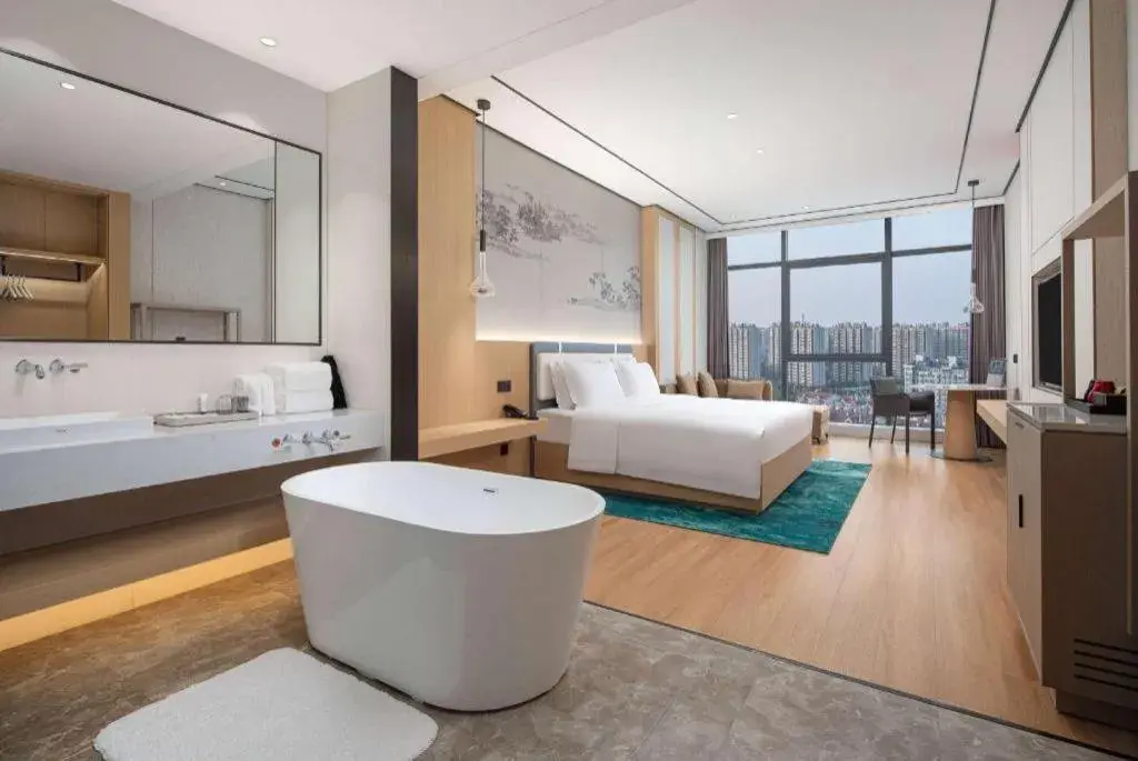 Bed in Ramada Encore by Wyndham Jinan Shanghe Bed in Ramada Encore by Wyndham Jinan Shanghe