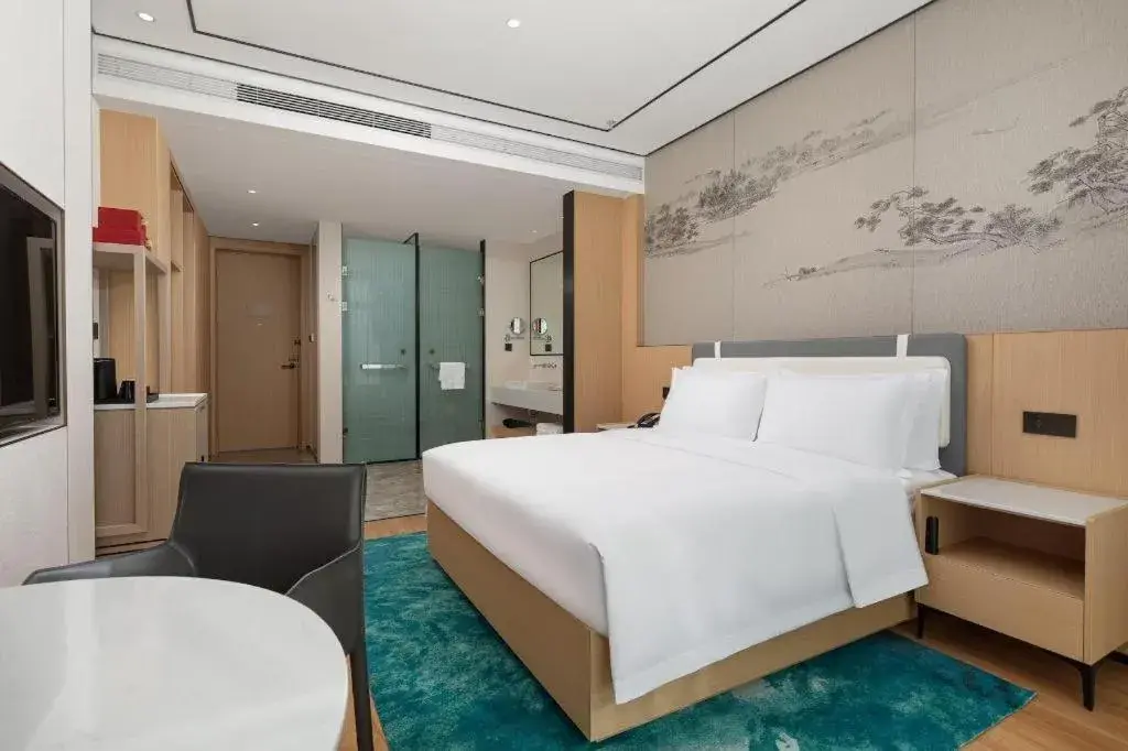 Bed in Ramada Encore by Wyndham Jinan Shanghe Bed in Ramada Encore by Wyndham Jinan Shanghe
