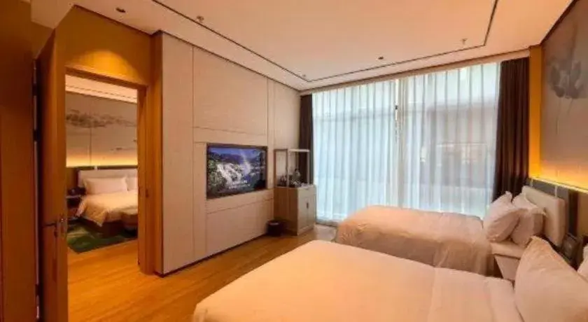 Bed in Ramada Encore by Wyndham Jinan Shanghe Bed in Ramada Encore by Wyndham Jinan Shanghe