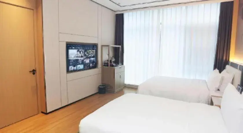 Bed in Ramada Encore by Wyndham Jinan Shanghe Bed in Ramada Encore by Wyndham Jinan Shanghe