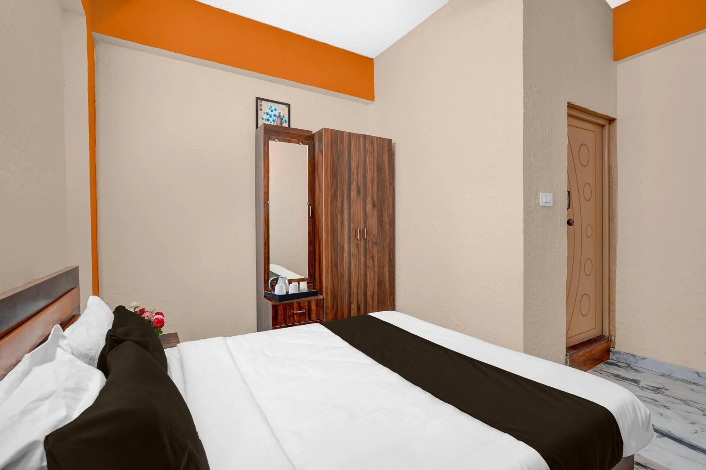 Bedroom, Bed in Super Hotel O Diamond Street Bangalore Formerly Sri Sai Guru Comfort