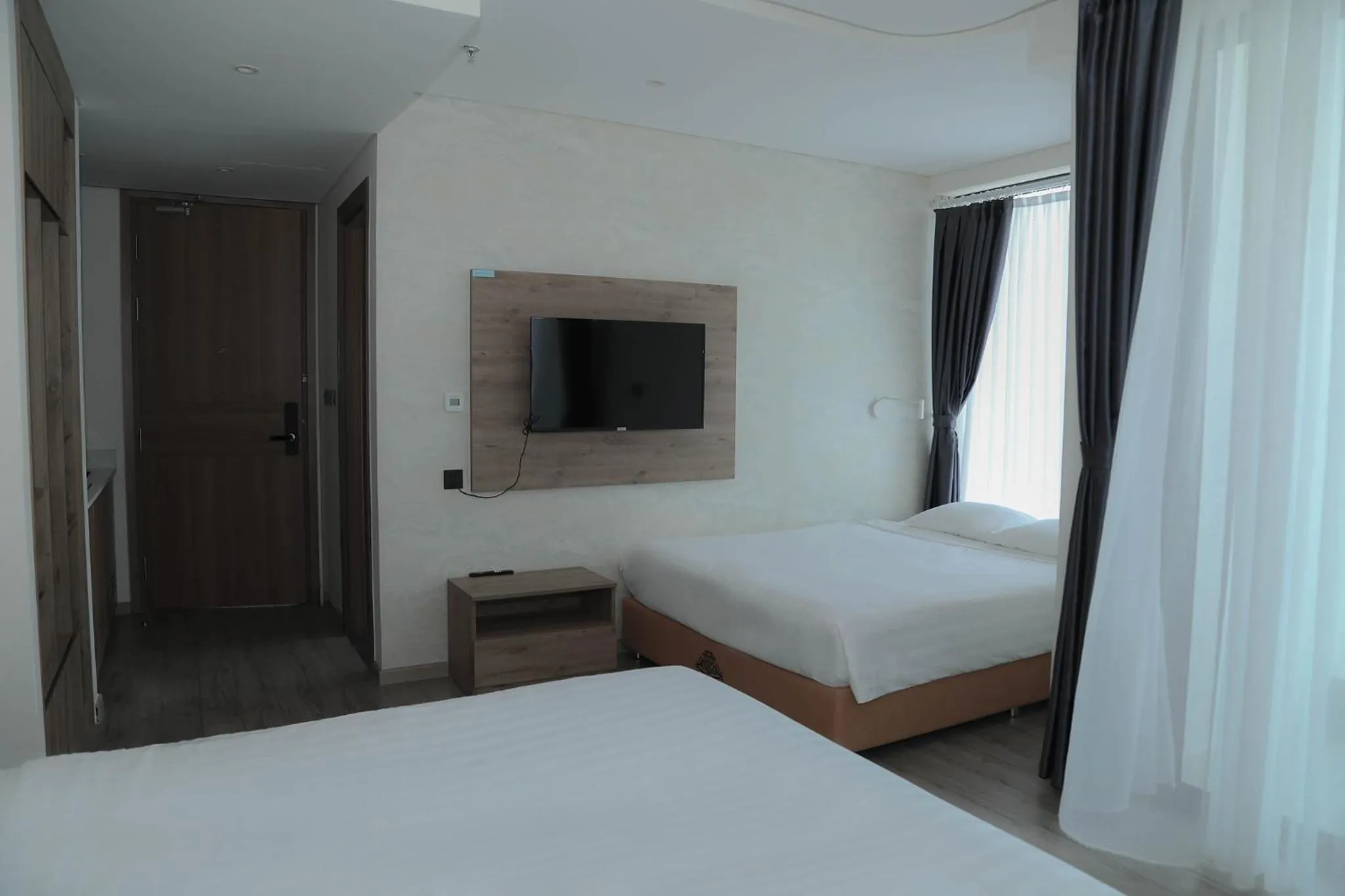 Photo of the whole room, Bed in Apec Mandala Hotel & Apartment Tuy Hòa