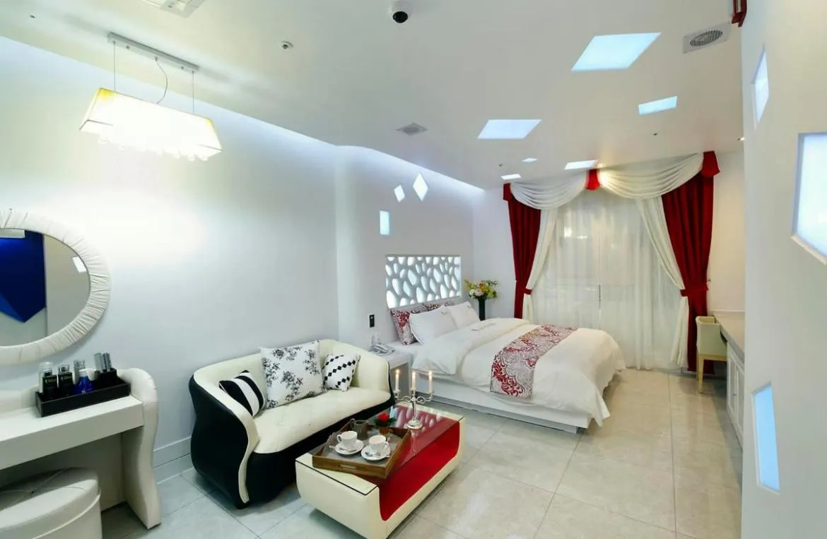 Bed in Gentleman Hotel