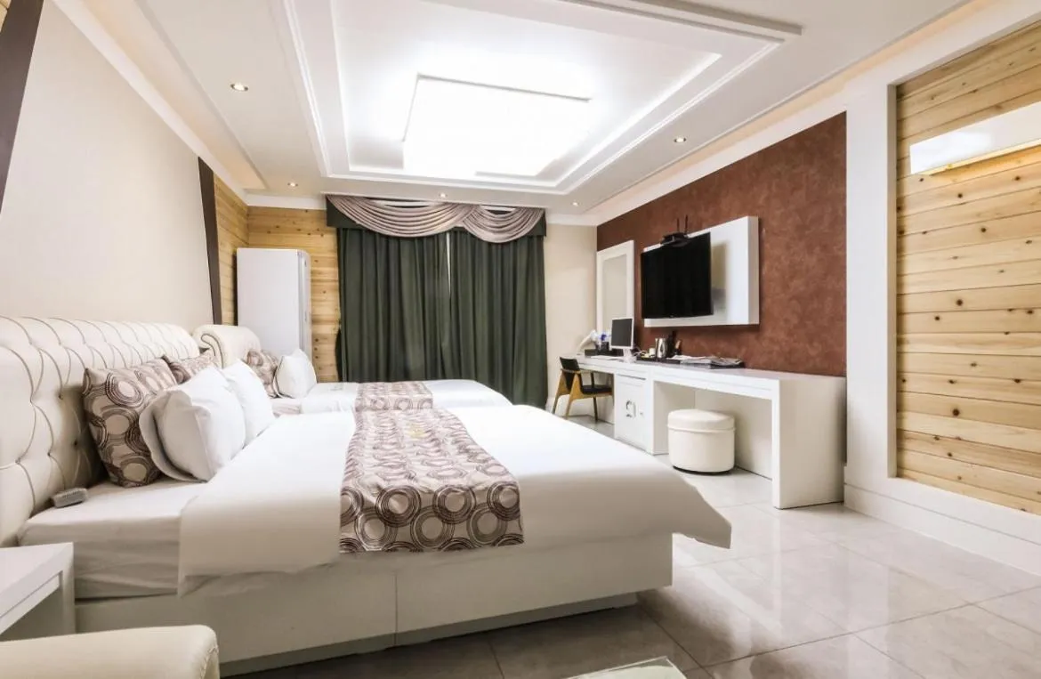 Bed in Gentleman Hotel