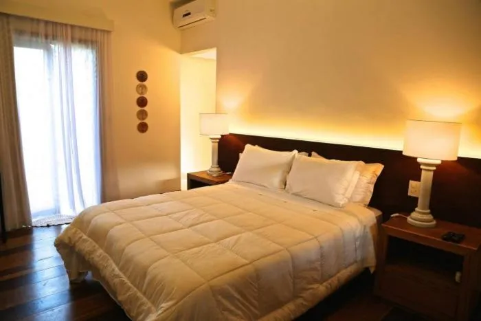 Bed in Pousada Casa das Fontes