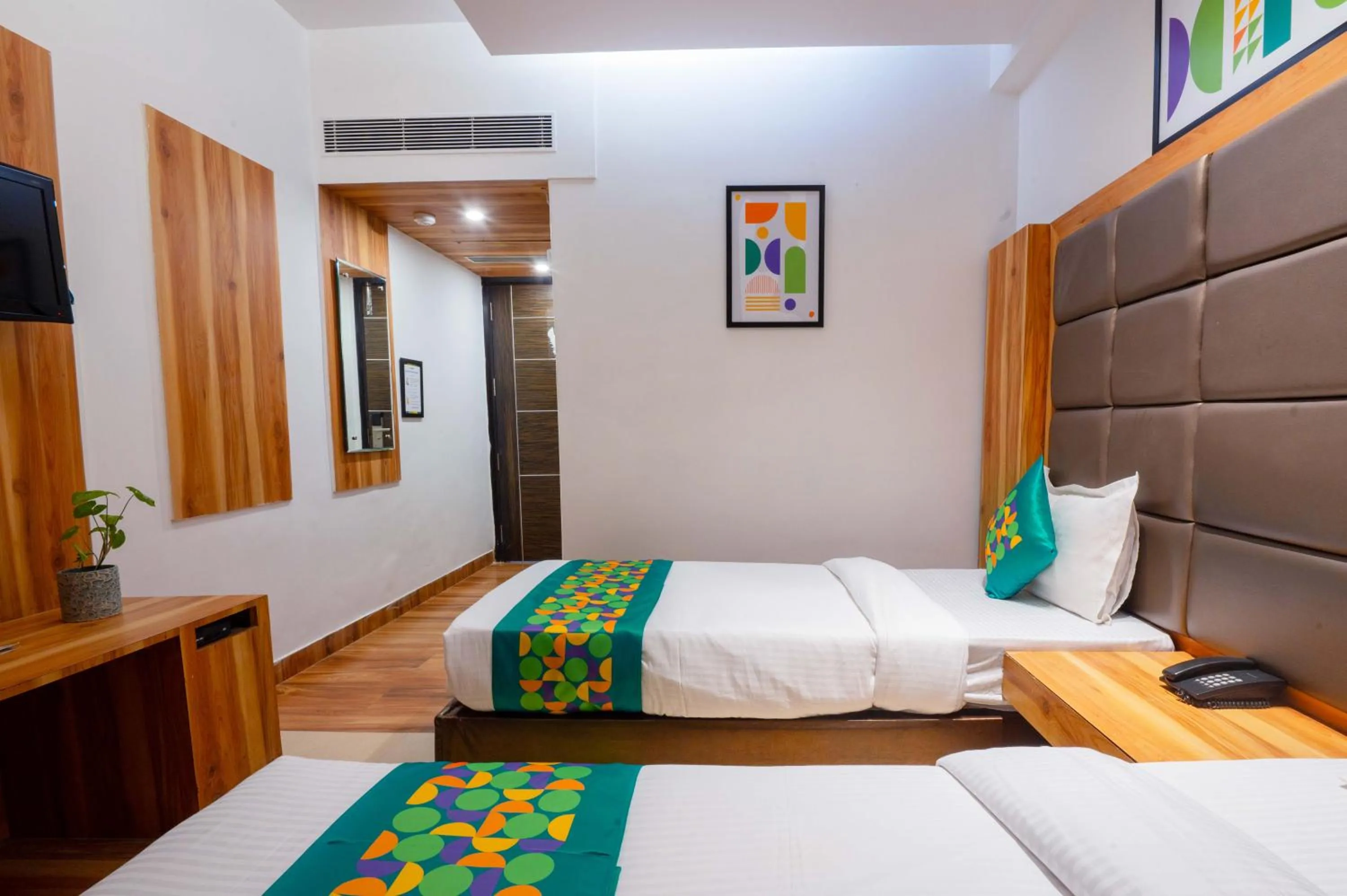 Bedroom, Bed in Treebo Twin Tree