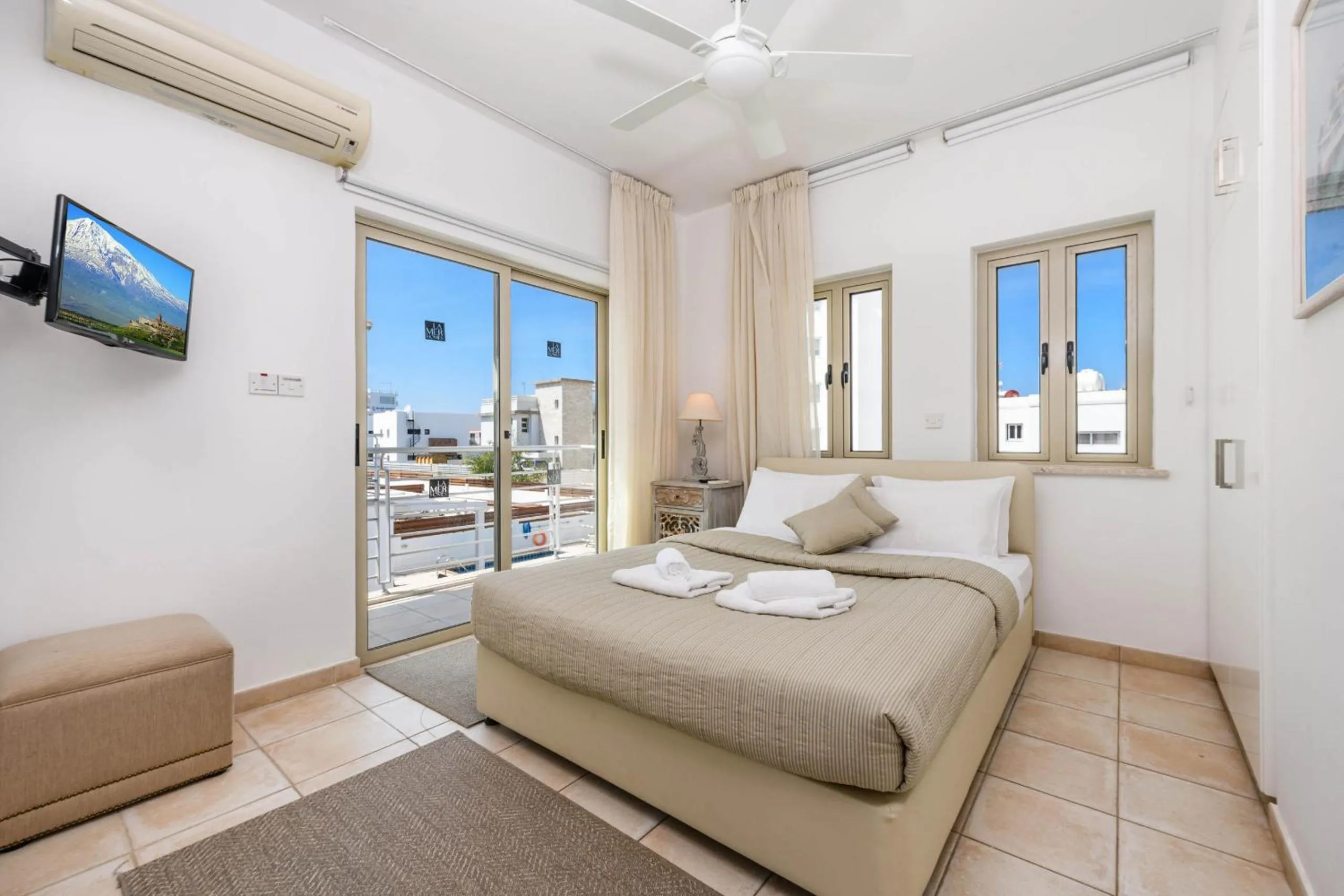 Bed in Sunrise Bay Villa #5
