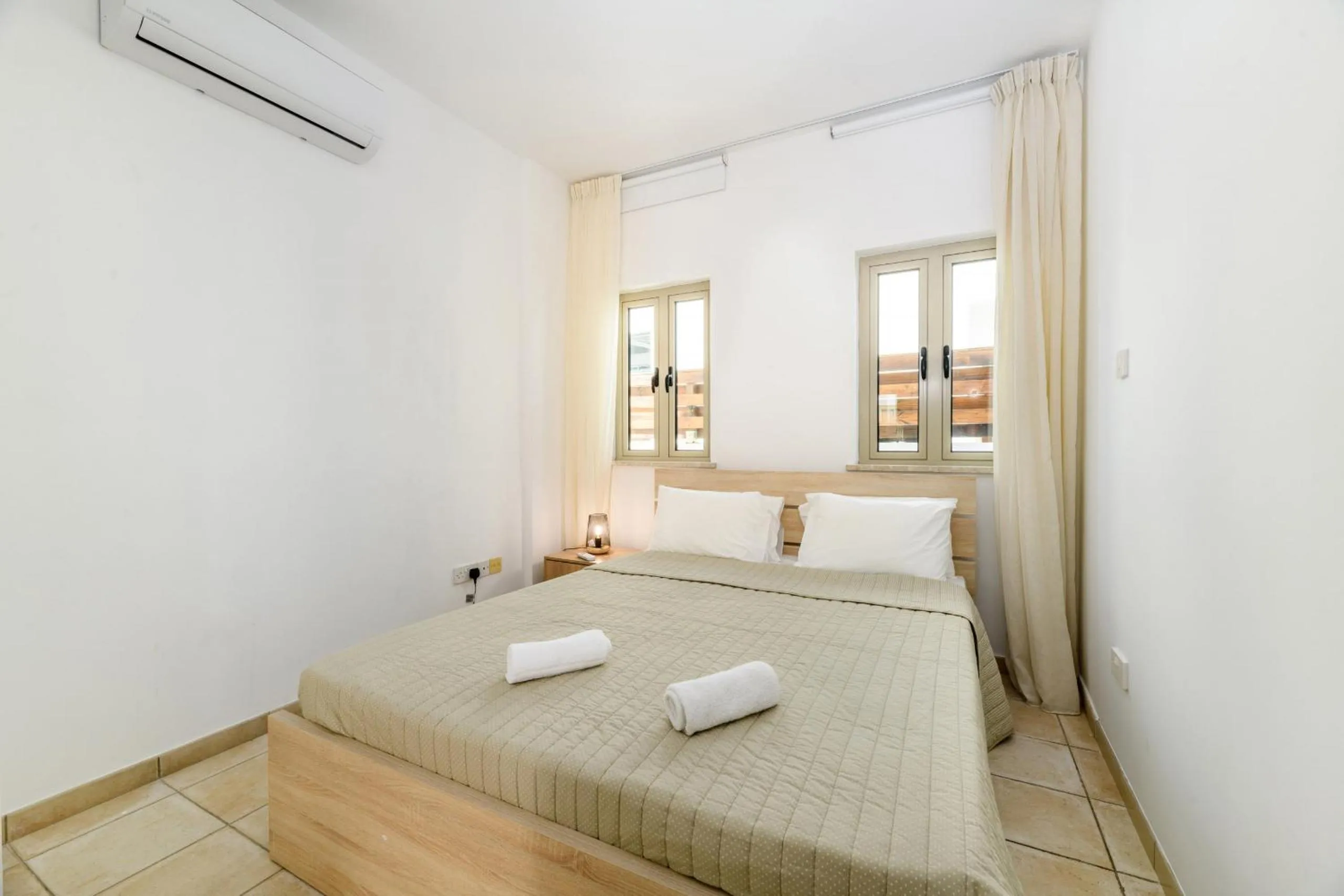 Bed in Sunrise Bay Villa #5