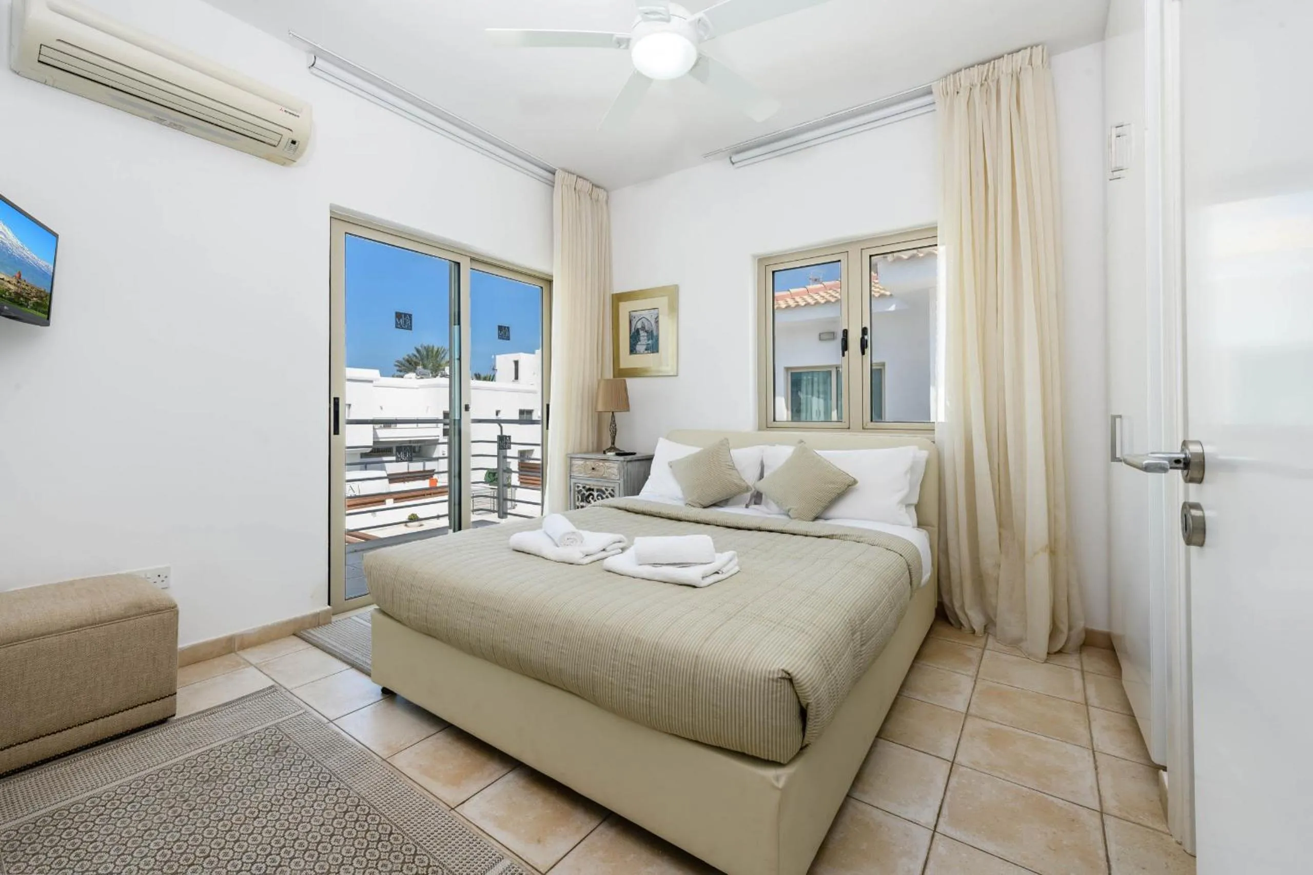 Bed in Sunrise Bay Villa #5