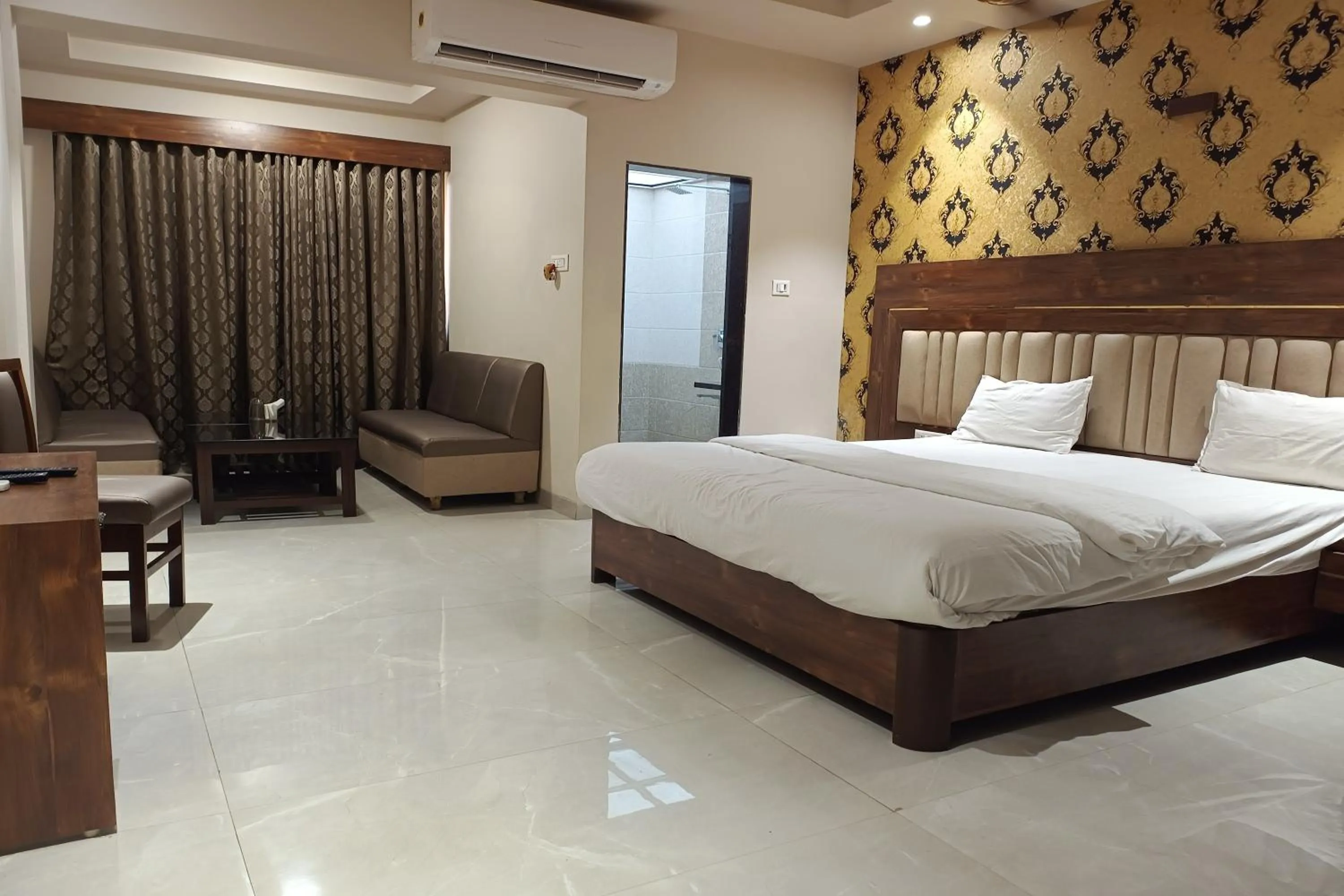 air conditioner, Bed in Hotel Apratim Lodging & Boarding