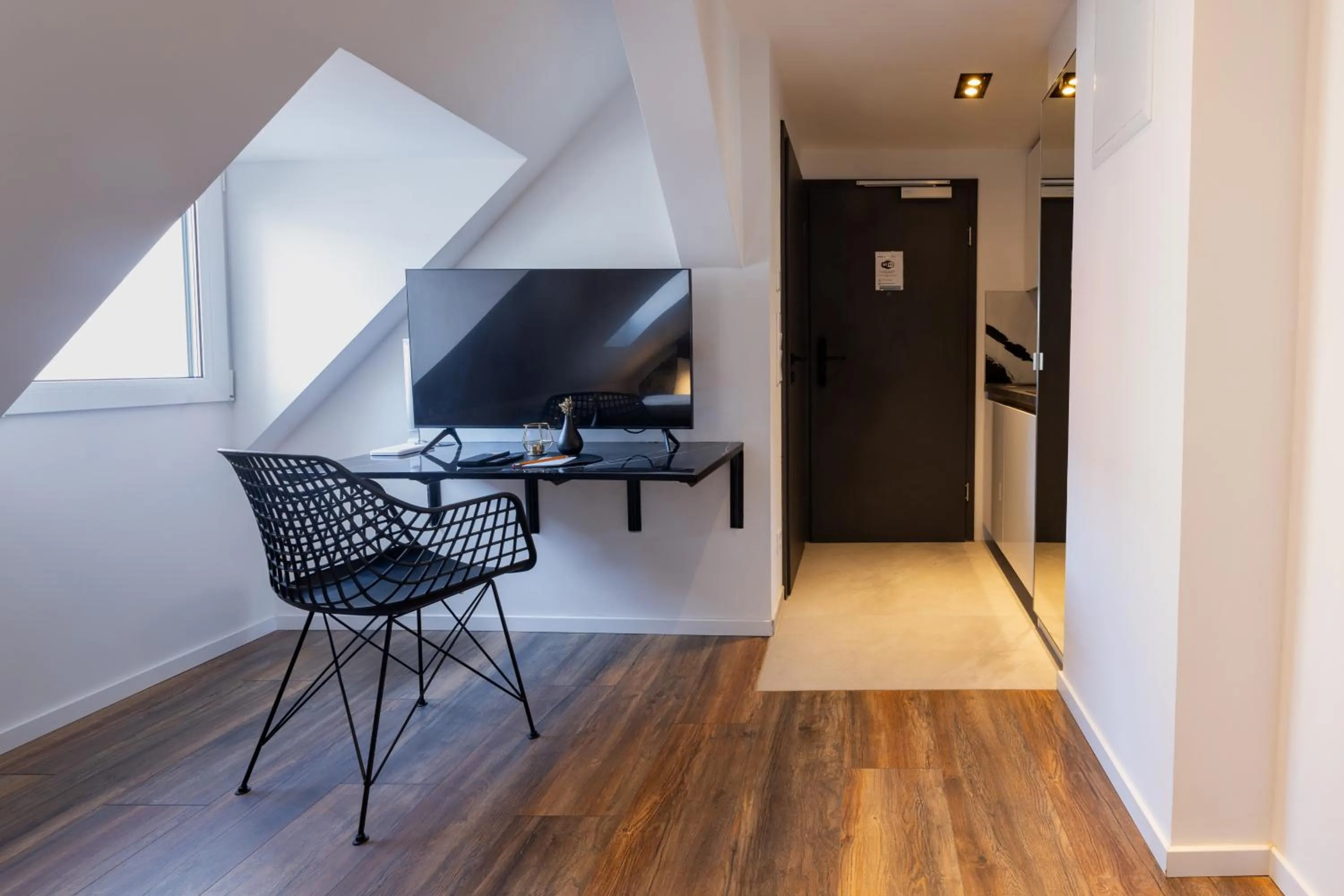 Communal lounge/ TV room in Urban Design Suites Nürnberg