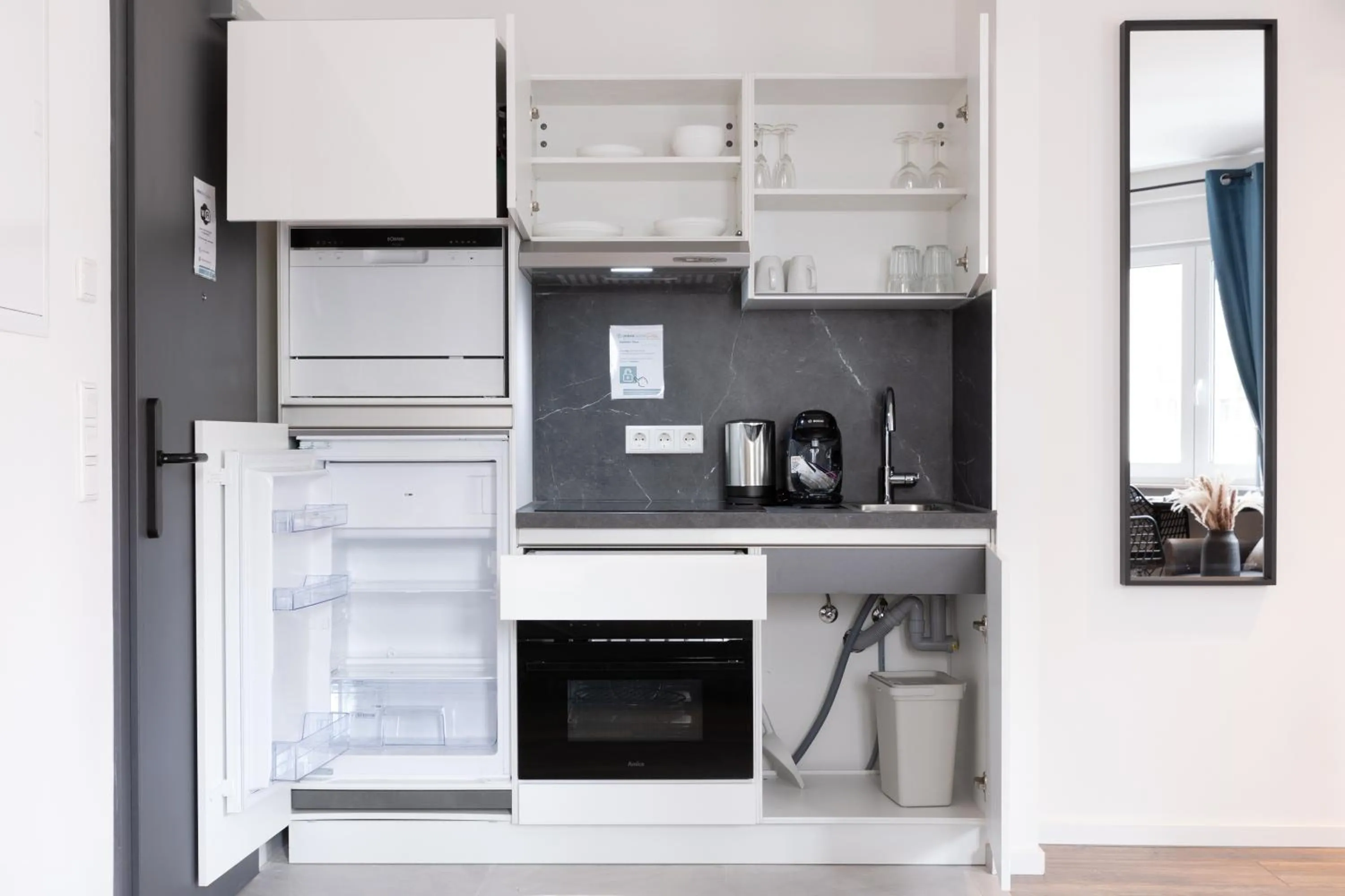 Kitchen or kitchenette in Urban Design Suites Nürnberg