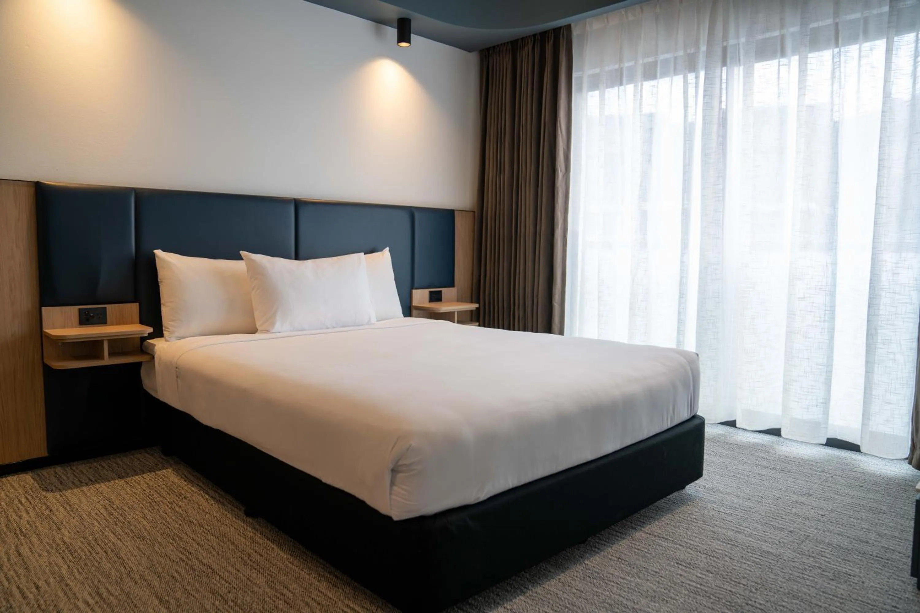 Bedroom, Bed in Value Suites Penrith