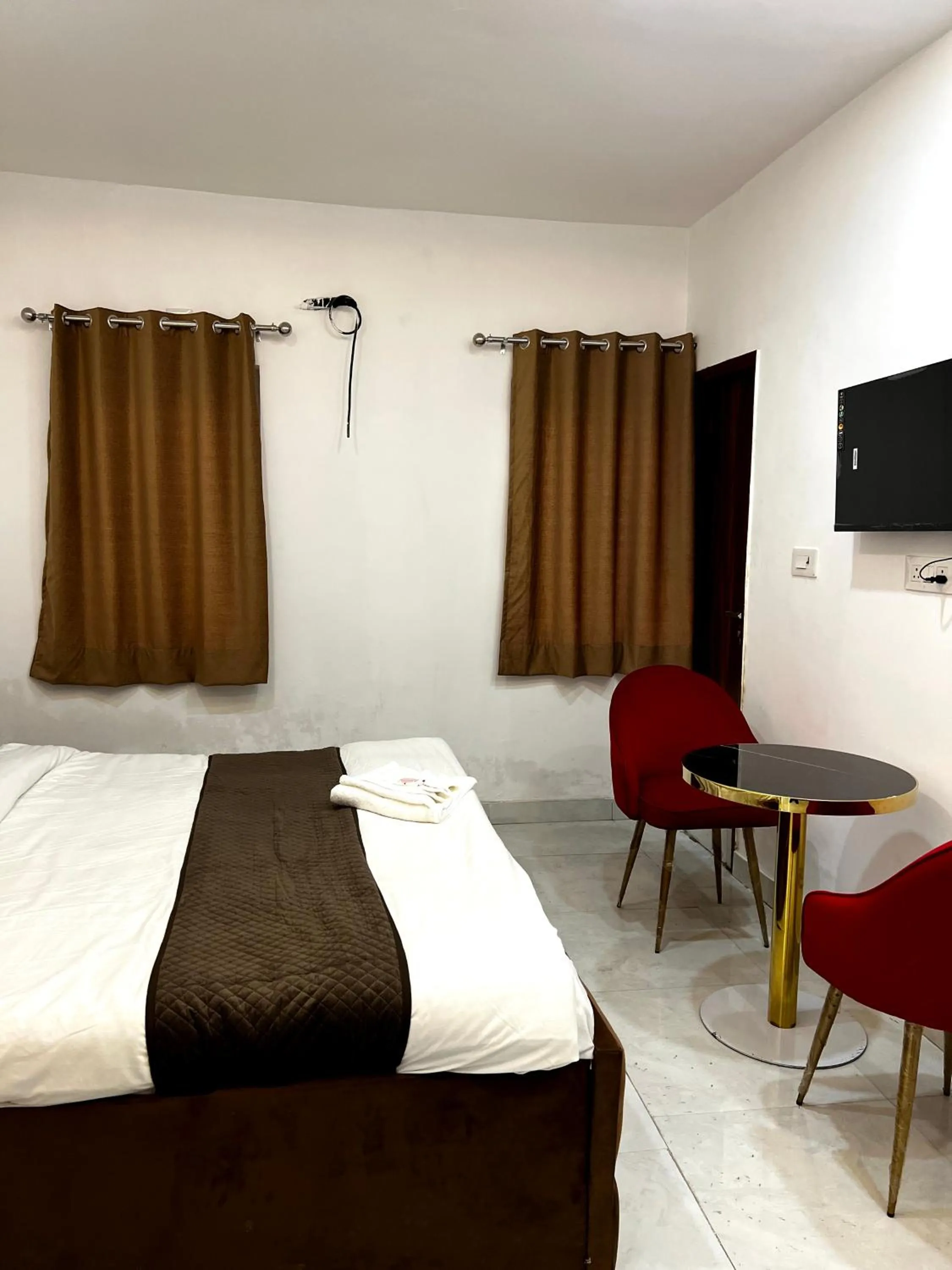 Photo of the whole room, Bed in Hotel Trending Stay