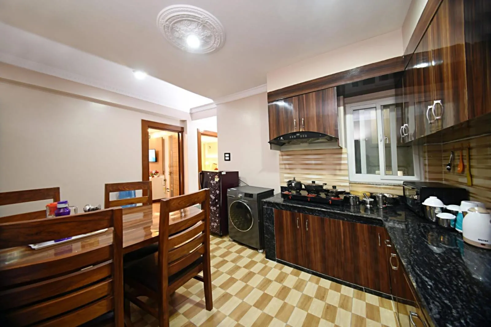 Kitchen or kitchenette in Alpine Apartment and Homestay