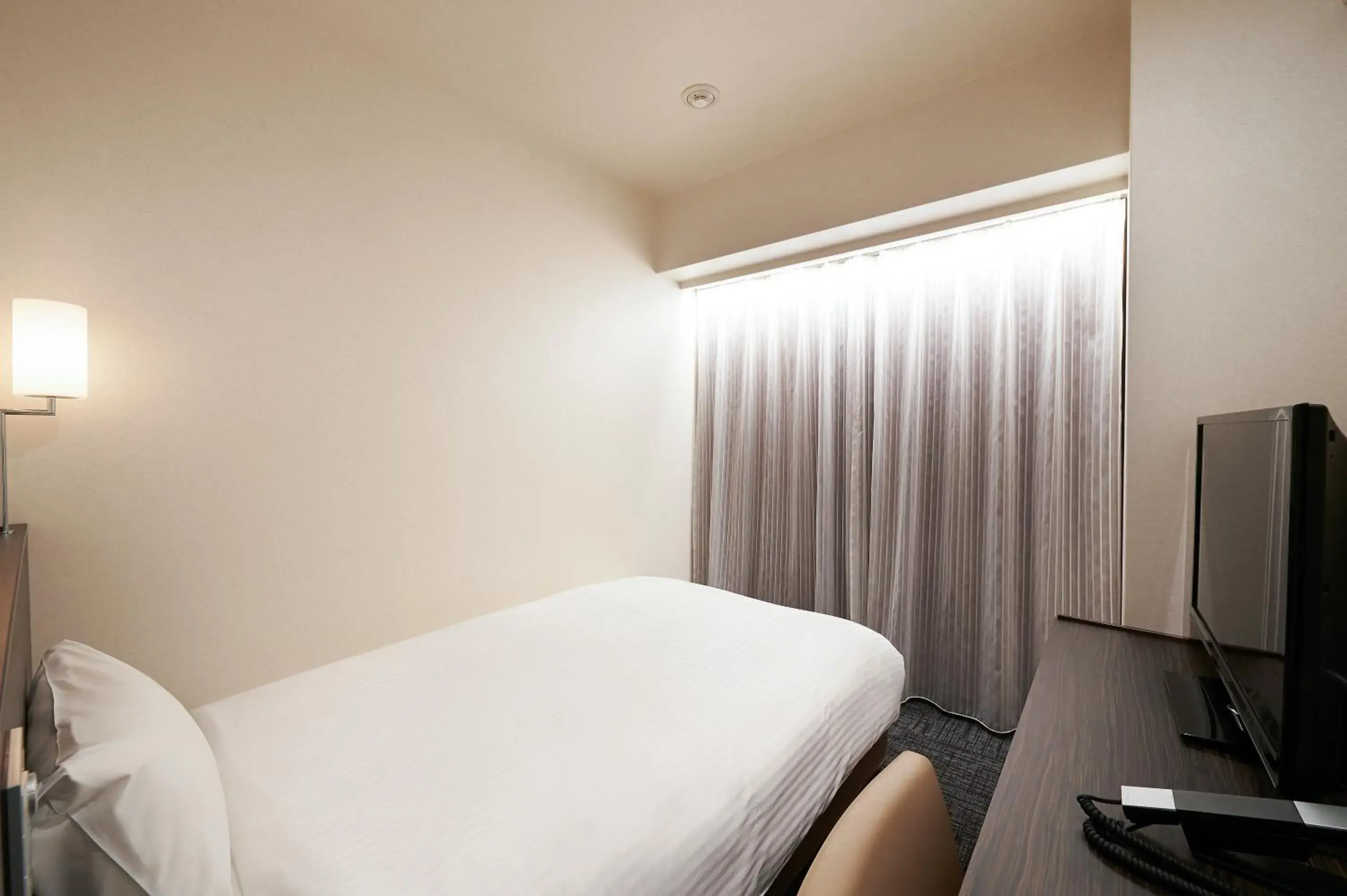 Bed in Sotetsu Fresa Inn Ochanomizu Jimbocho Bed in Sotetsu Fresa Inn Ochanomizu Jimbocho