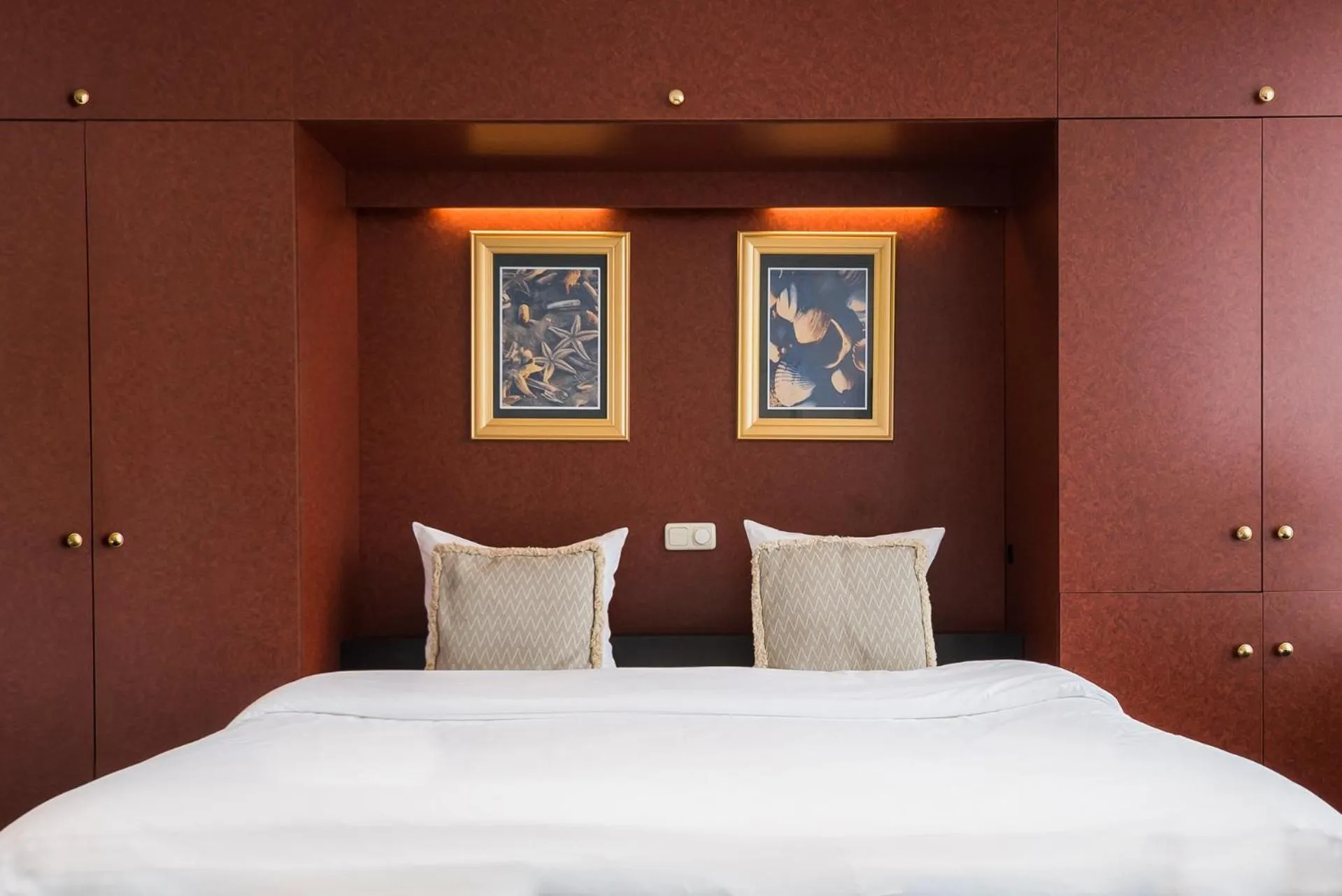 Bed in Prominent Inn Hotel