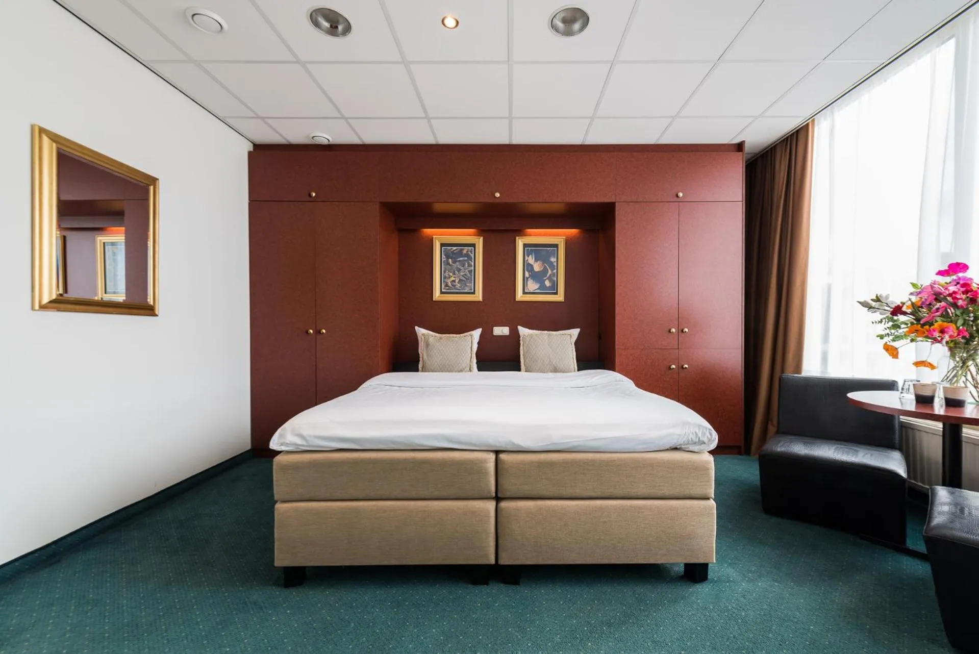 Bed in Prominent Inn Hotel