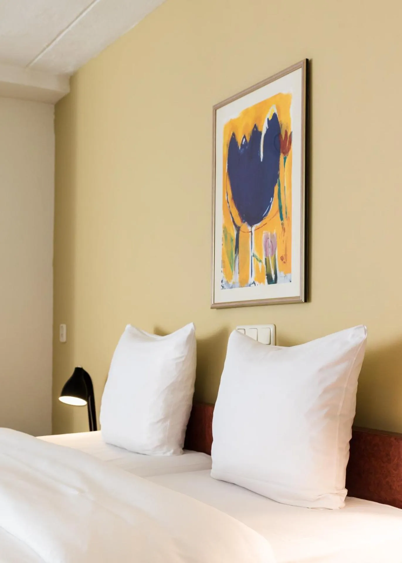 Bed in Prominent Inn Hotel