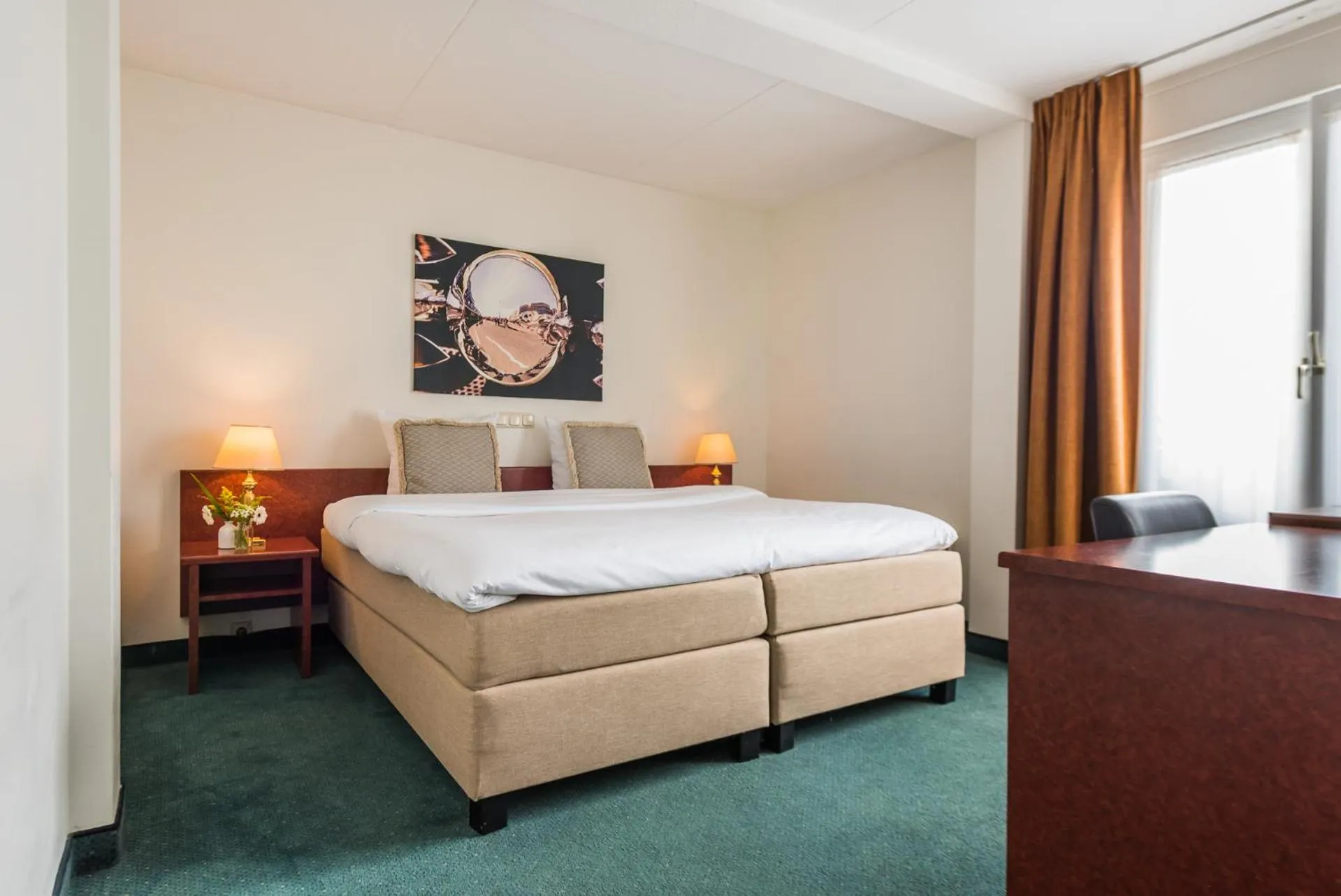 Bed in Prominent Inn Hotel