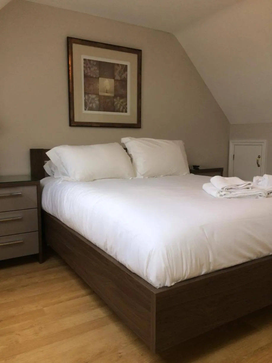 Bed in Hollies Hotel