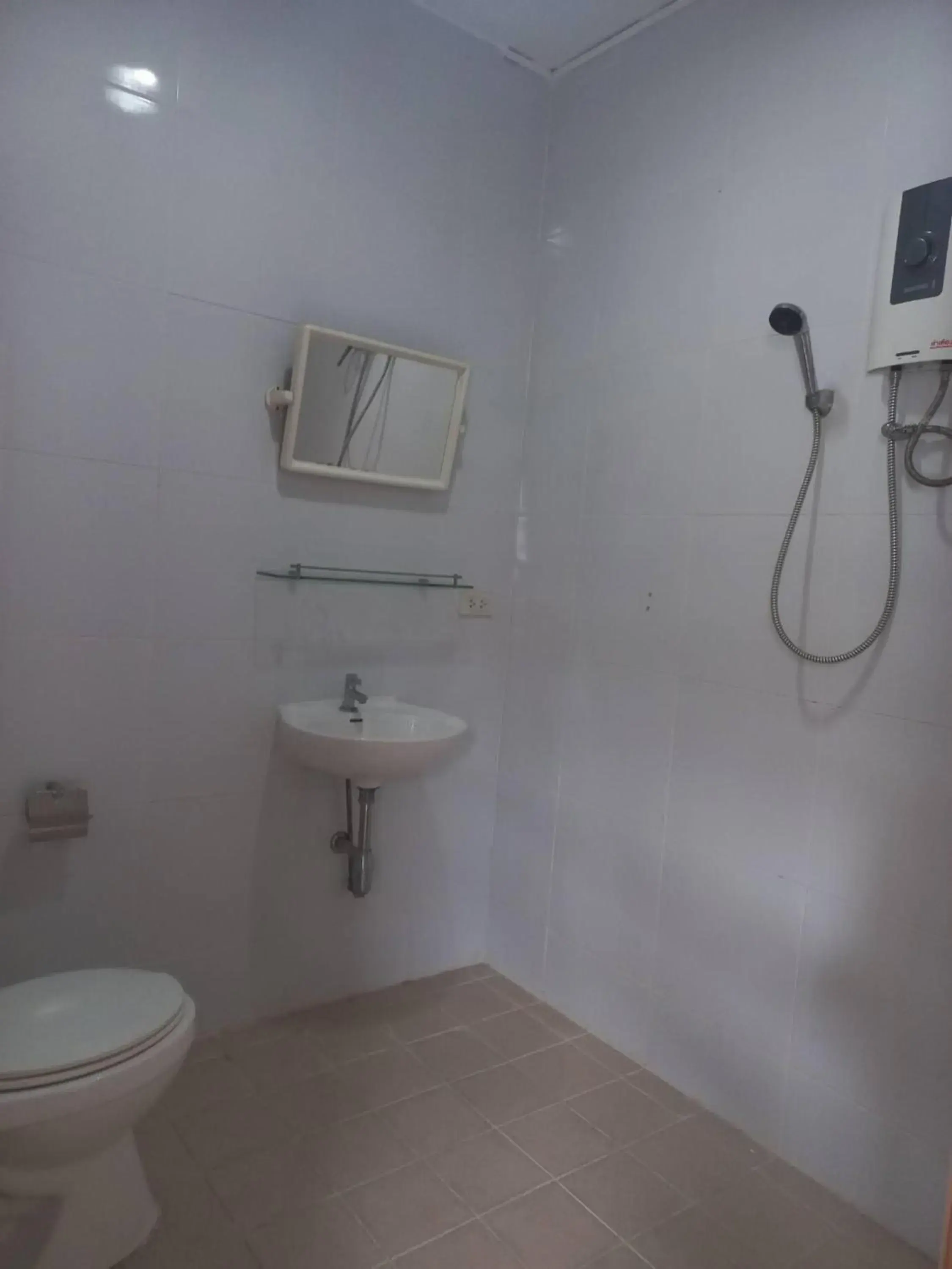 Bathroom in OYO 75474 Funkey Fulung Andy & Tan Guest House Bathroom in OYO 75474 Funkey Fulung Andy & Tan Guest House