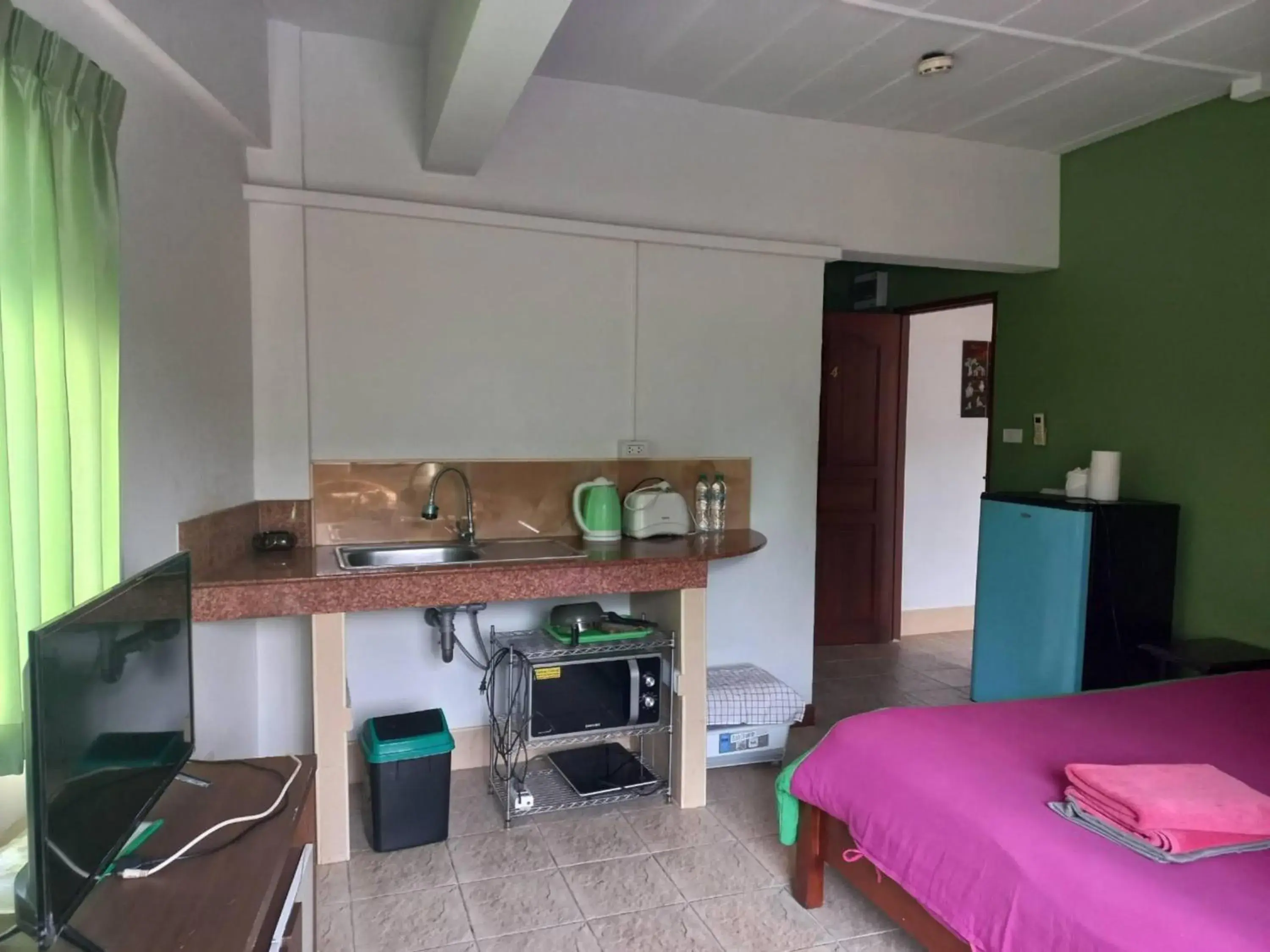 Bedroom, Bed in OYO 75474 Funkey Fulung Andy & Tan Guest House Bedroom, Bed in OYO 75474 Funkey Fulung Andy & Tan Guest House