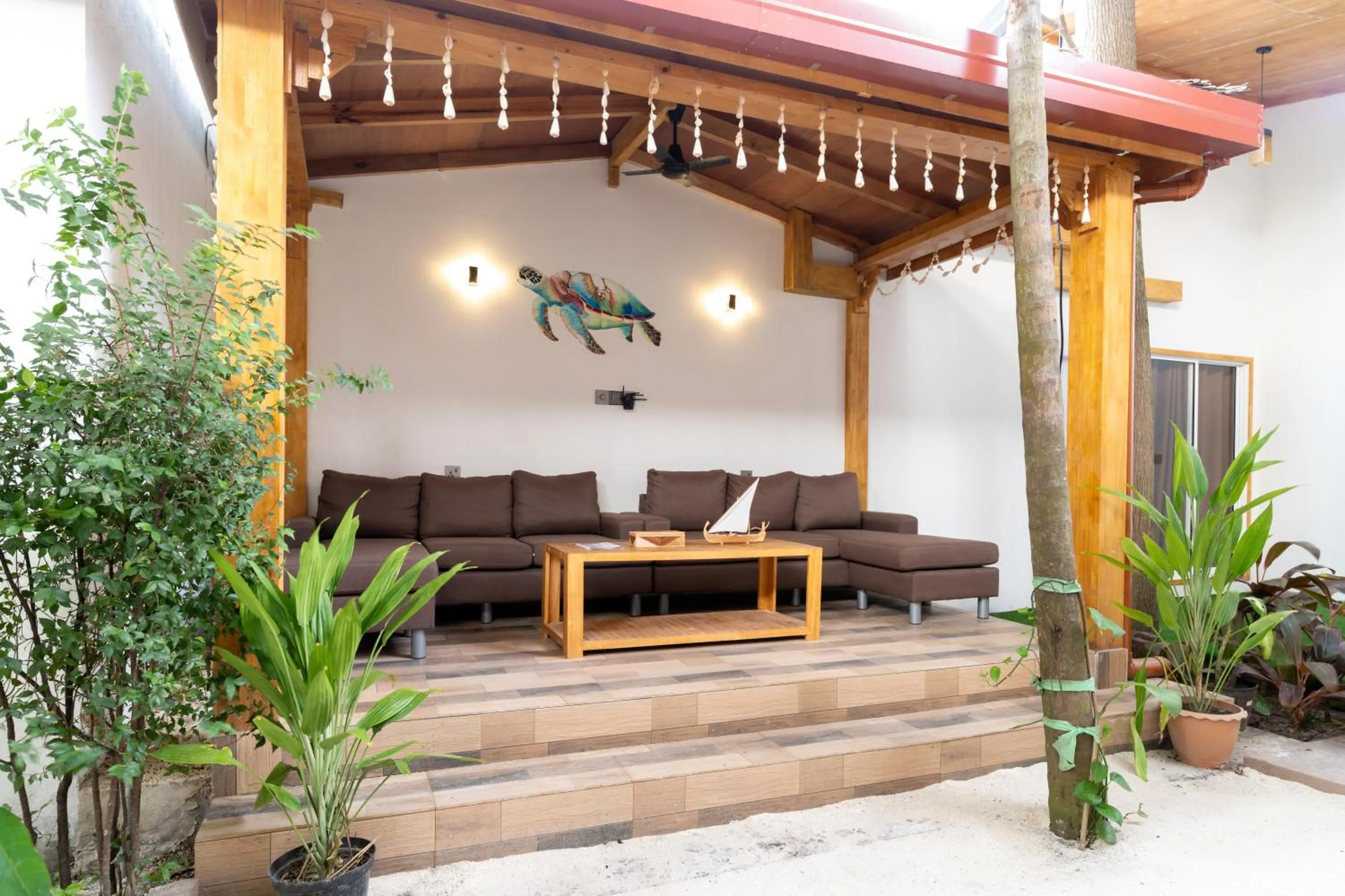 Communal lounge/ TV room in Tropico villa