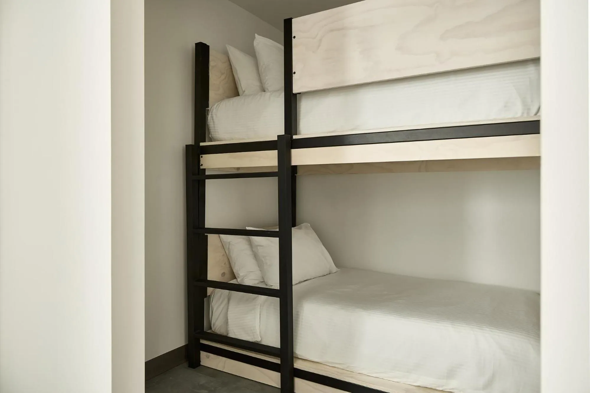 Bed in AutoCamp Sequoia