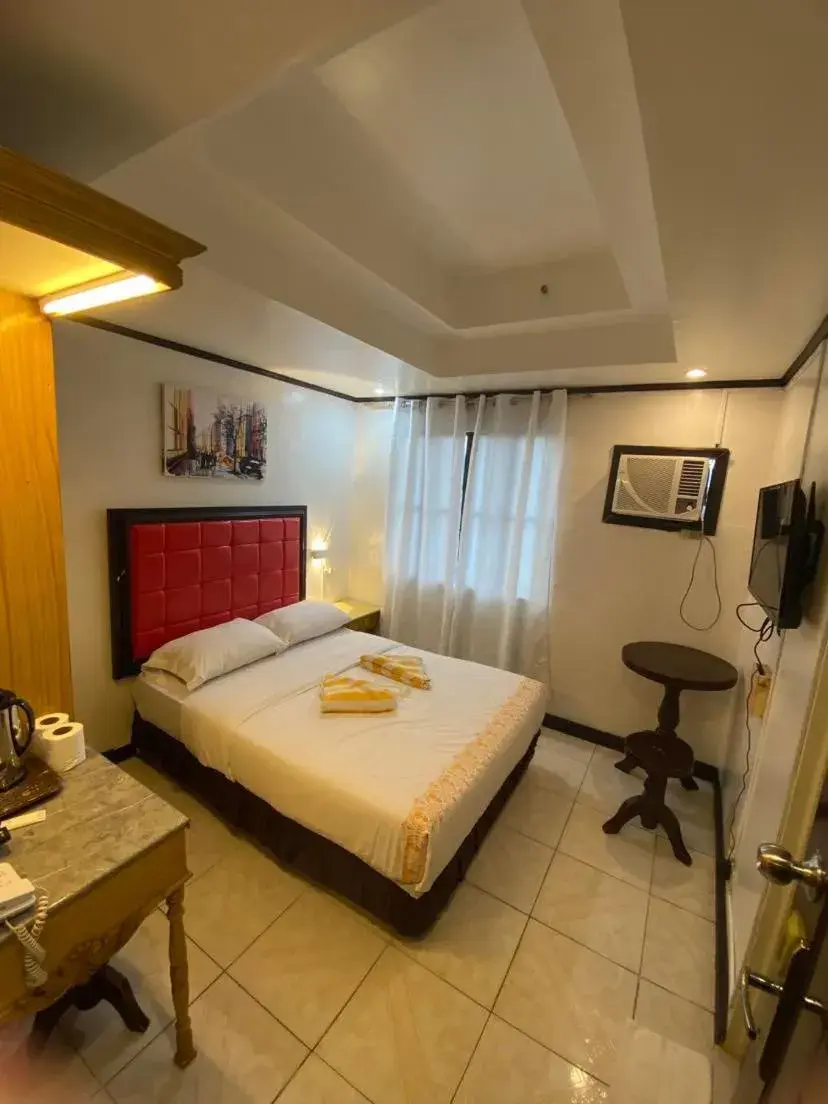 Bed in Sugarland Suites Bed in Sugarland Suites