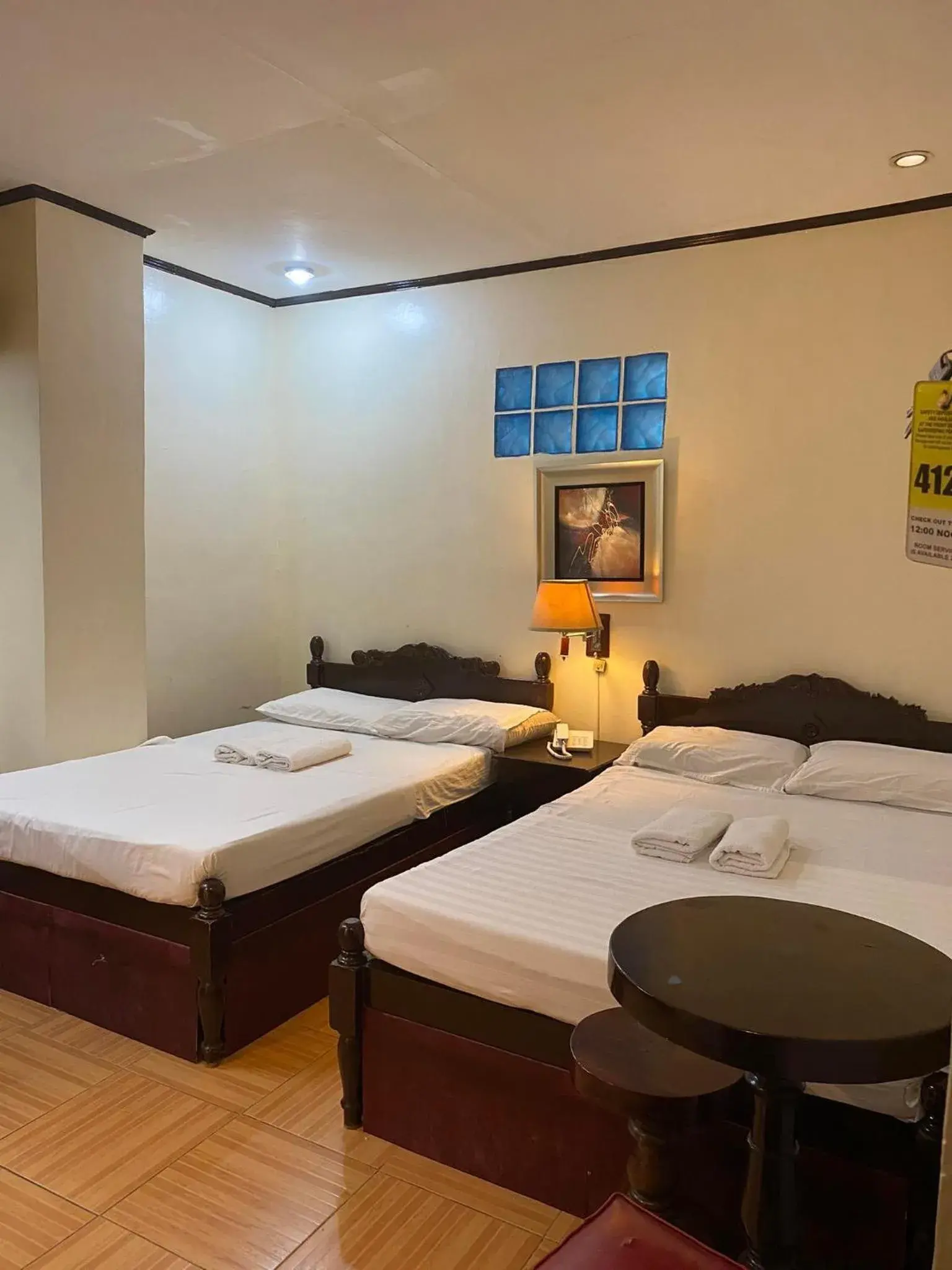 Bed in Sugarland Suites Bed in Sugarland Suites