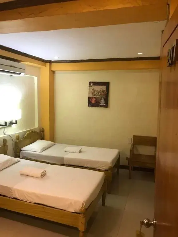 Bed in Sugarland Suites Bed in Sugarland Suites