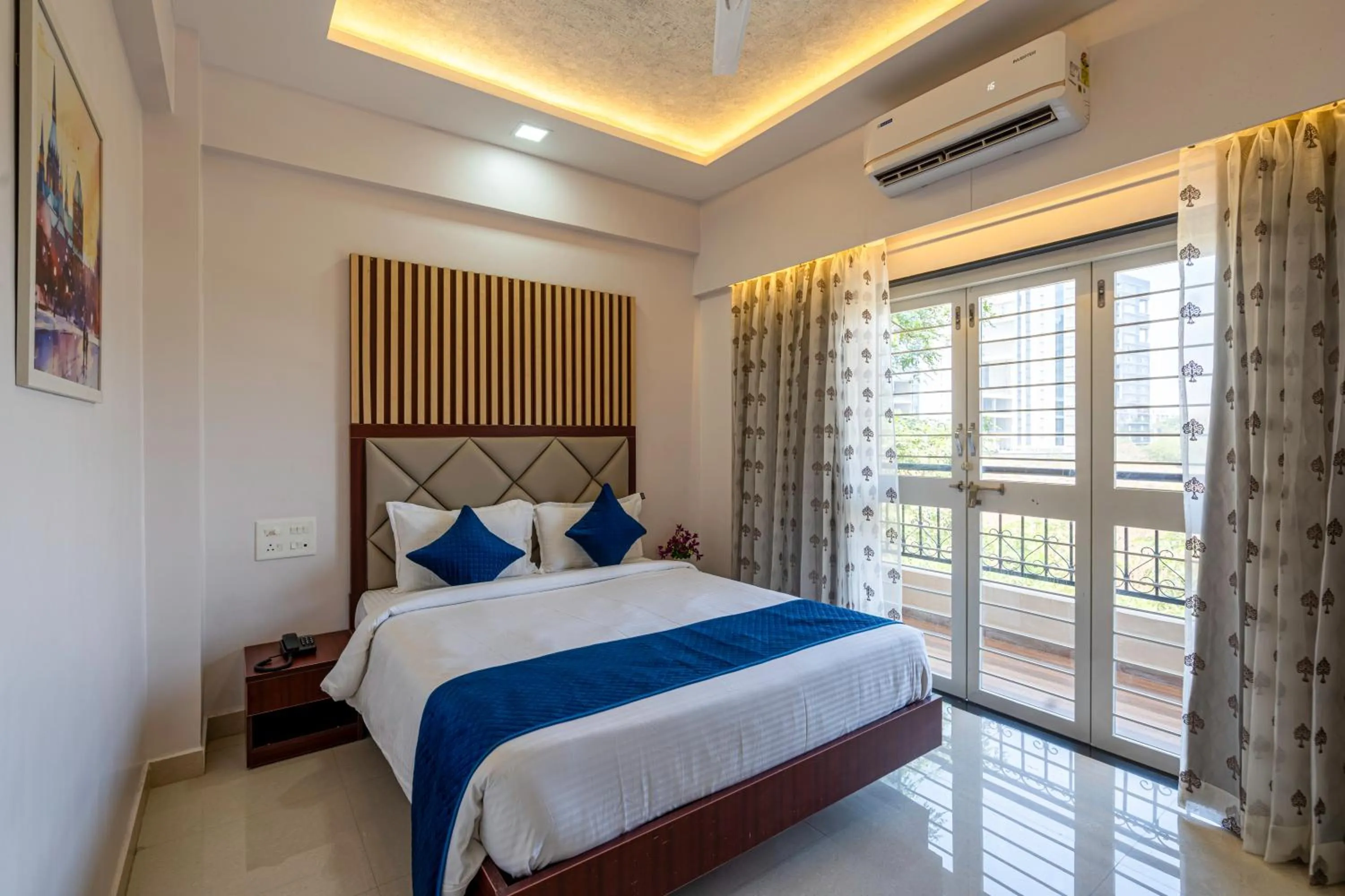 Bed in StayBird - Divine Suites, Business Hotel, Kharadi